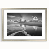 Elegant silver-framed wall art featuring a serene seascape design, complete with a white mat, perfect for enhancing modern home decor and coastal themes.