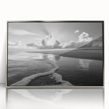 Framed wall art collection featuring a serene seascape design with soft blue and grey tones, elegantly displayed in a sleek silver frame for modern decor.