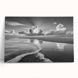 Stretched canvas wall art featuring serene seascape design with calming blues and greens, leaning against a modern white wall, perfect for coastal decor.