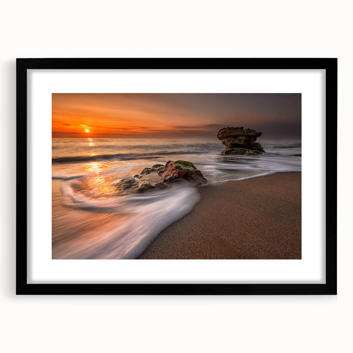 Framed black wall art featuring a serene seascape design with a white mat, perfect for coastal-themed decor. Ideal for living rooms and beach houses.