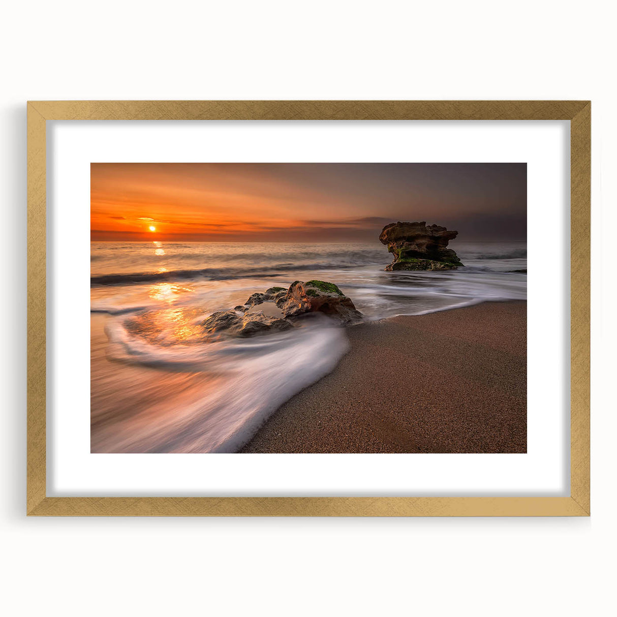 Elegant wall art collection featuring a gold-framed landscape and seascape design with a mat, showcasing serene ocean views and natural beauty, perfect for home decor.