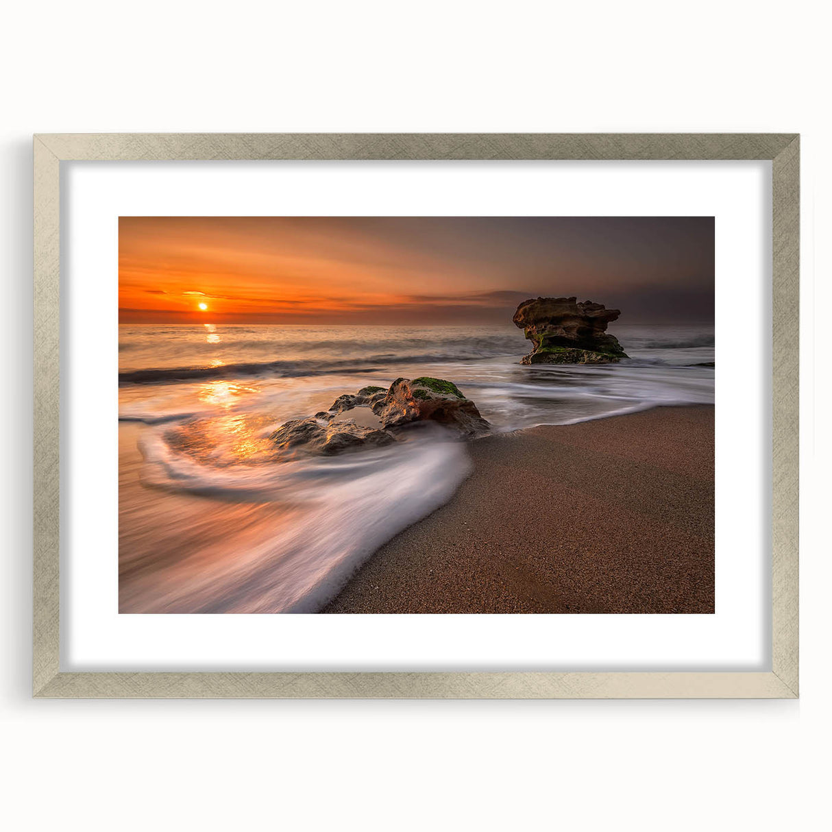 Framed seascape wall art collection featuring a serene coastal landscape in soft blue and silver tones, elegantly matted and designed to enhance home decor.