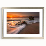 Framed seascape wall art collection featuring a serene coastal landscape in soft blue and silver tones, elegantly matted and designed to enhance home decor.