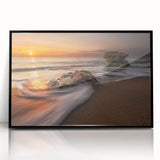 Framed acrylic wall art featuring a serene seascape design with calming blue hues, elegantly displayed against a sleek black frame, ideal for modern home décor.