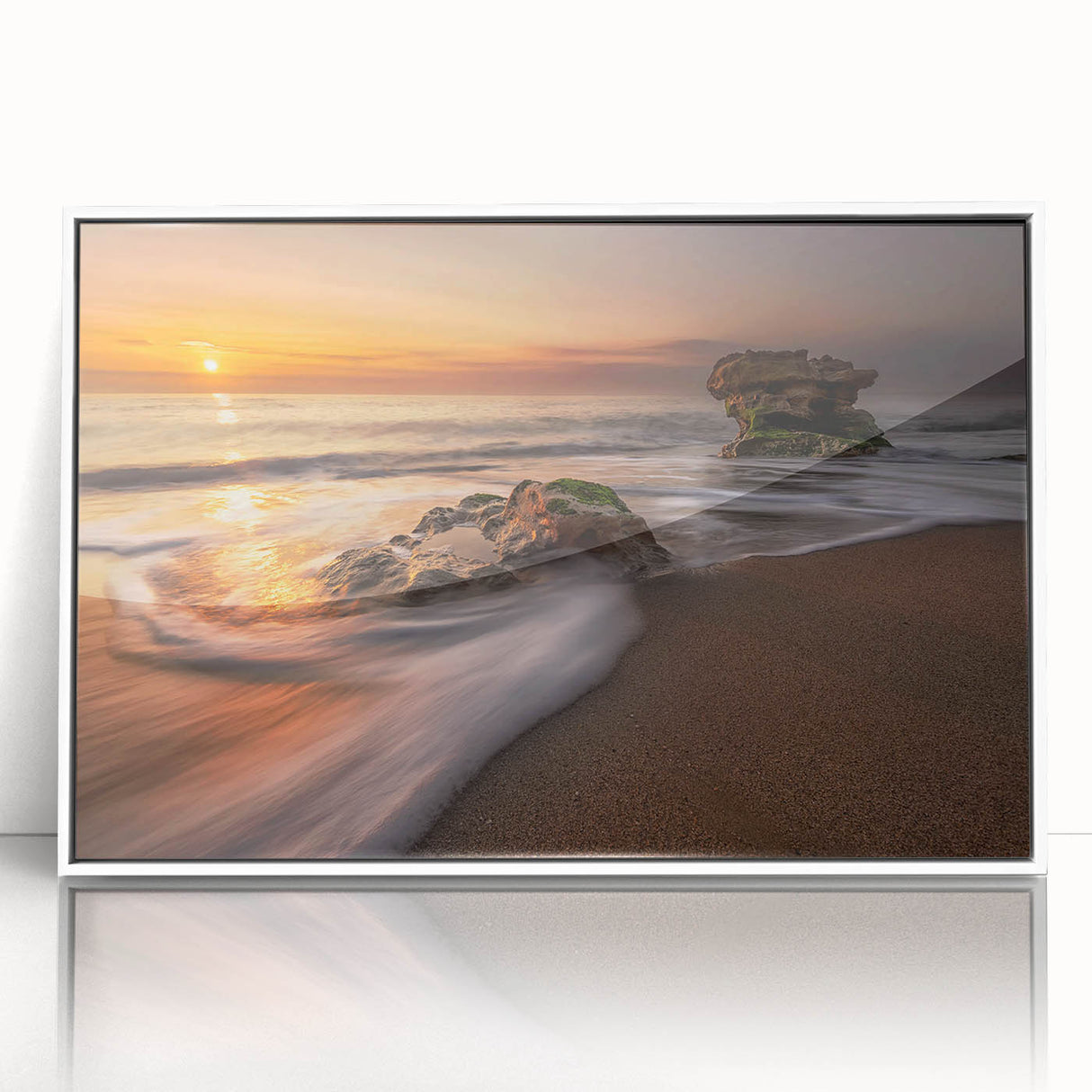 Framed acrylic wall art depicting a serene seascape with calming blue and white tones, perfect for coastal-themed home decor. Ideal for enhancing living spaces.