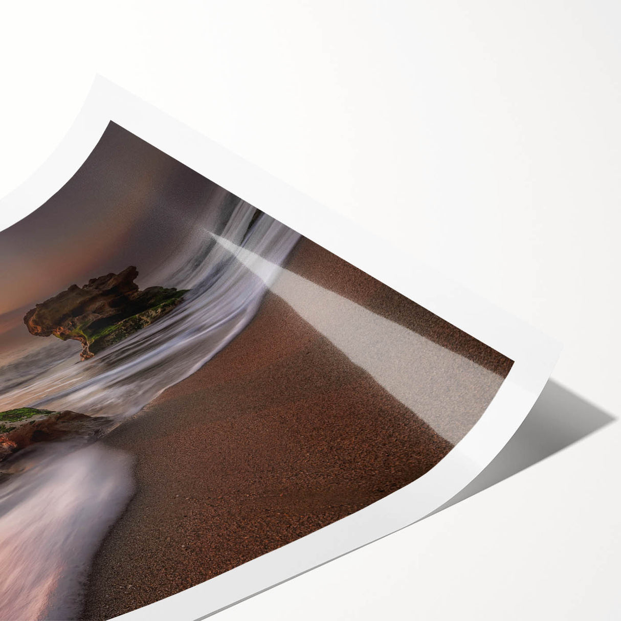 Rolled print showcasing a serene ocean landscape with vibrant blues and soft clouds, ideal for coastal home decor, packaged for safe delivery.