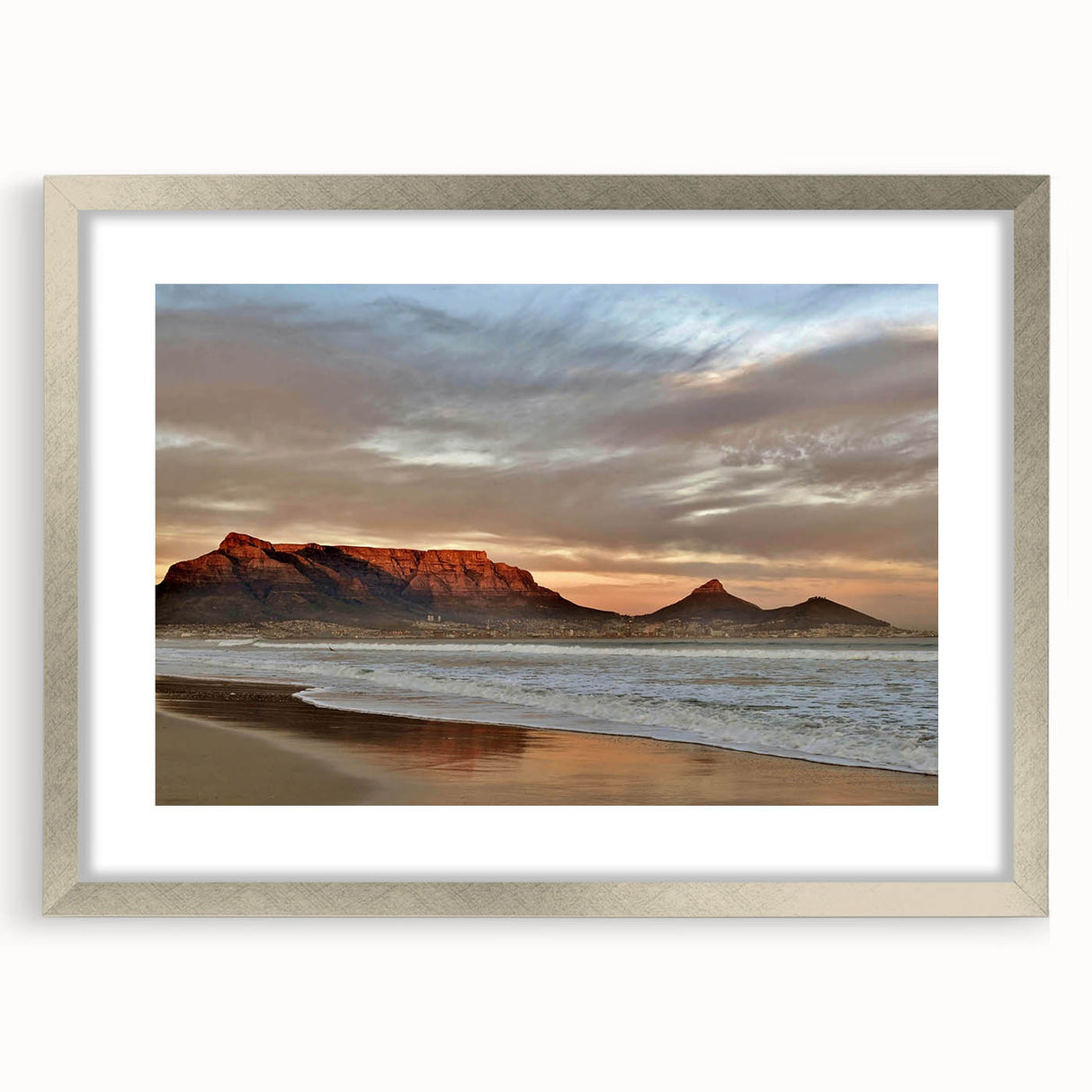 Framed wall art collection featuring a stunning seascape design with a silver mat, showcasing tranquil ocean waves and a serene sky, perfect for home decor.