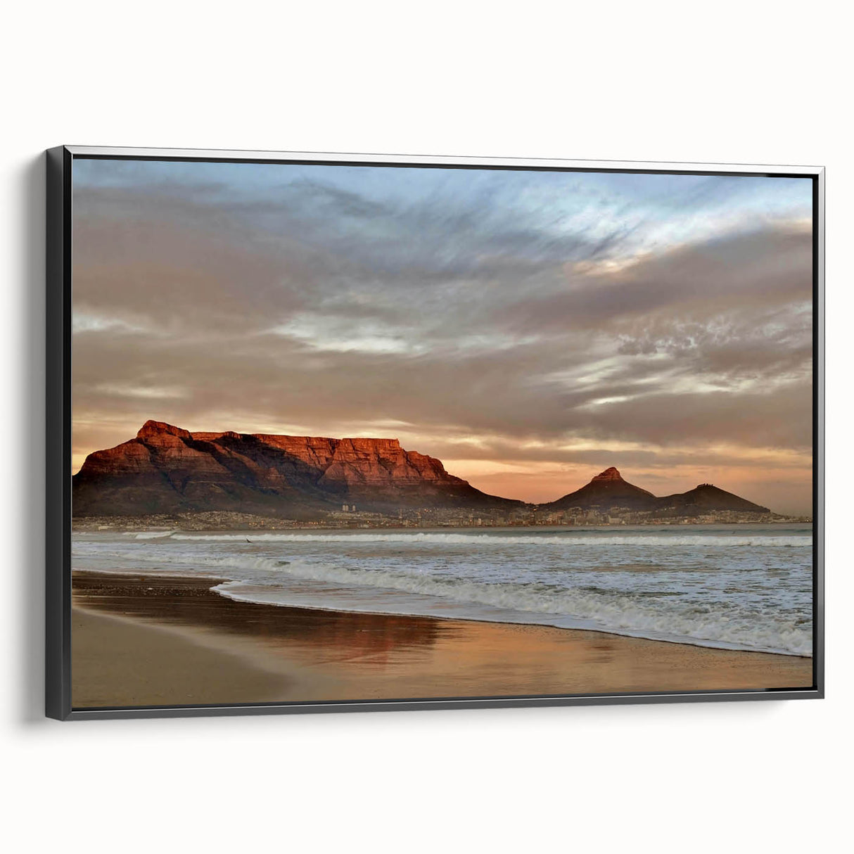 Framed canvas wall art depicting a serene seascape design, featuring vibrant blues and greens, displayed from a black side view, ideal for coastal decor.