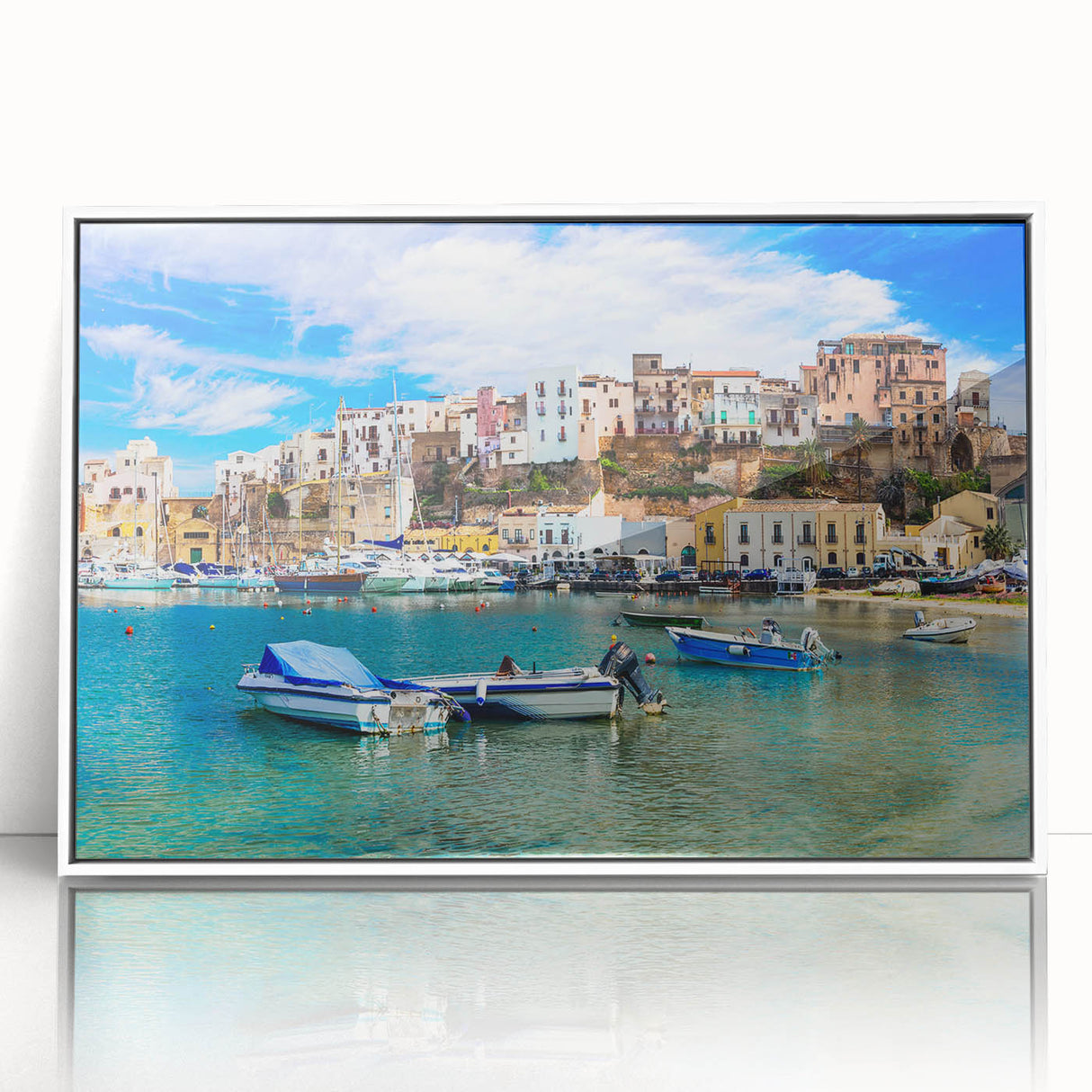 Framed acrylic wall art featuring a serene seascape design with vibrant blue and white tones, displayed in a modern white frame, perfect for coastal-themed decor.