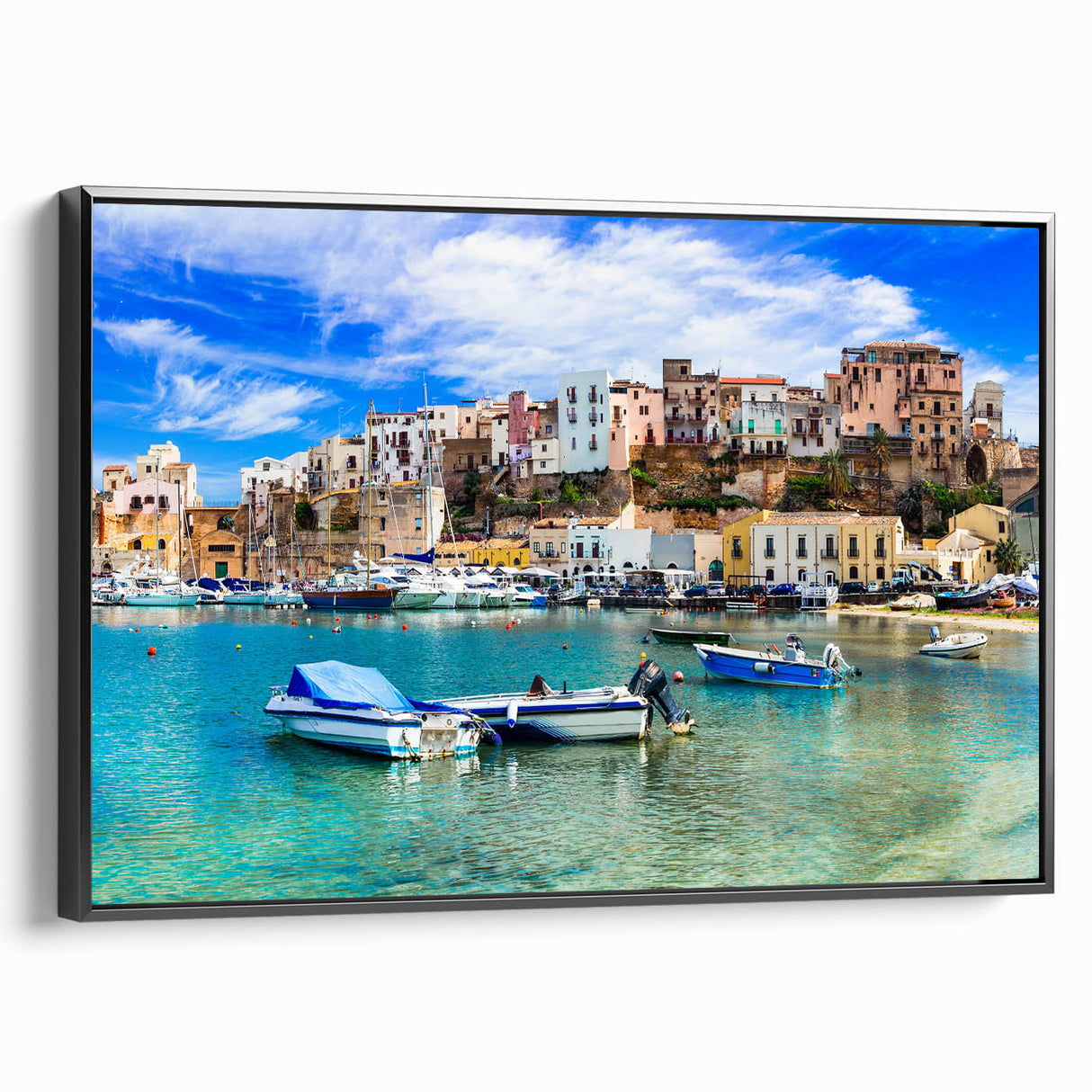 Framed canvas wall art showcasing a serene seascape design with vibrant blues and greens, set in a sleek black frame, ideal for home decor.