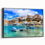 Framed canvas wall art showcasing a serene seascape design with vibrant blues and greens, set in a sleek black frame, ideal for home decor.