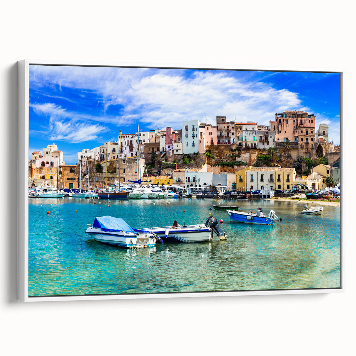 Framed canvas wall art depicting a serene seascape with soft waves and a pastel-colored sky, showcasing calming blues and whites for a coastal home decor accent.