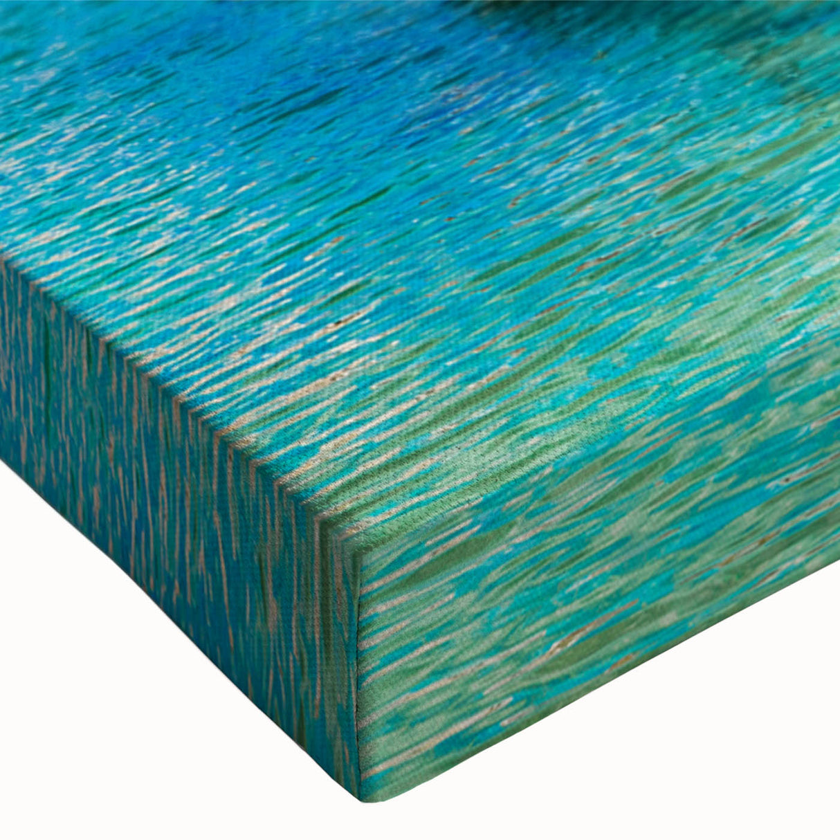 Close-up of a vibrant stretched canvas wall art piece showcasing an abstract seascape design, featuring bold blues and greens, perfect for modern home decor. The artwork captures the calming essence of ocean waves, ideal for enhancing living spaces.