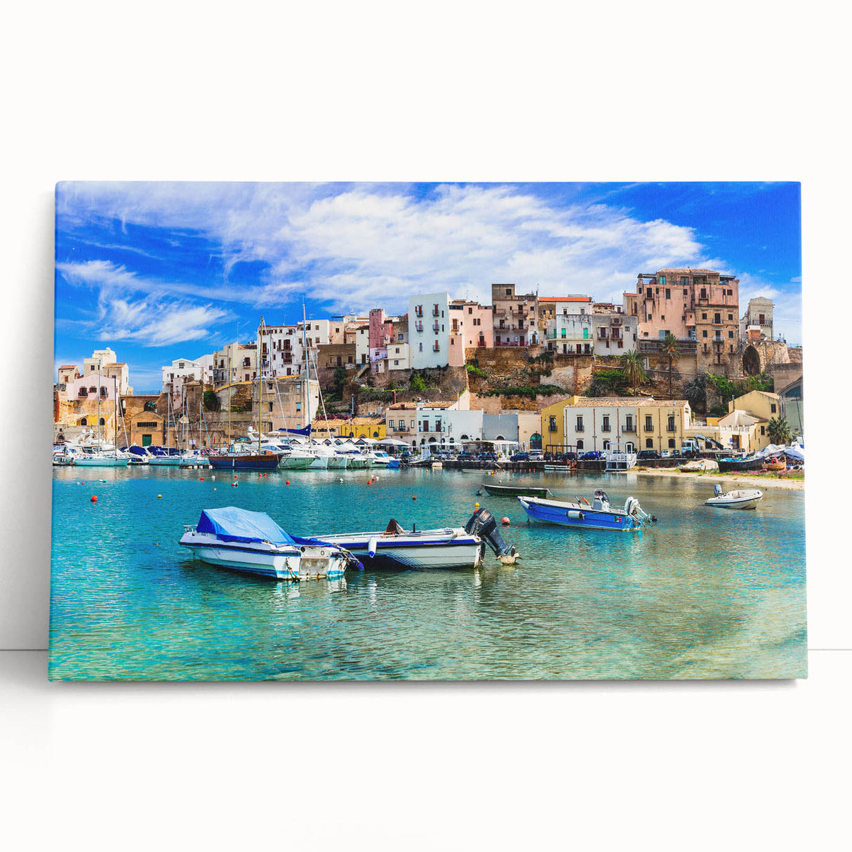 Stretched canvas wall art collection depicting a serene seascape design with calming blue and green hues, leaning against a rustic wooden backdrop, perfect for home decor.