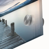 Close-up of a vibrant acrylic glass wall art piece showcasing a serene seascape, featuring calming blues and greens, perfect for home decor and coastal themes.