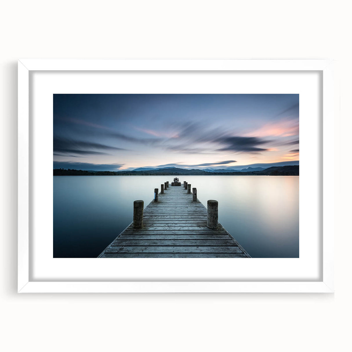 Framed wall art showcasing a vibrant seascape design with blue and white hues, elegantly matted in white, perfect for enhancing home decor aesthetics.