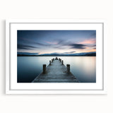 Framed wall art showcasing a vibrant seascape design with blue and white hues, elegantly matted in white, perfect for enhancing home decor aesthetics.
