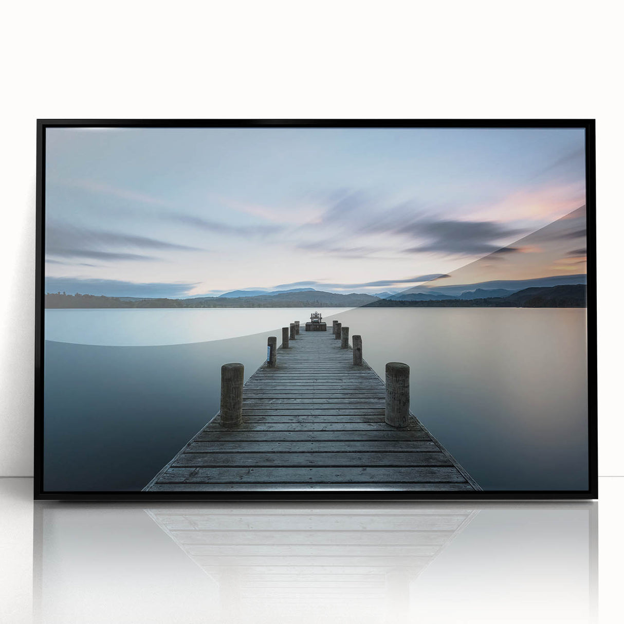 Framed acrylic wall art showcasing a serene seascape design with vibrant blues and greens, featuring a black frame for an elegant finish, ideal for home decor.