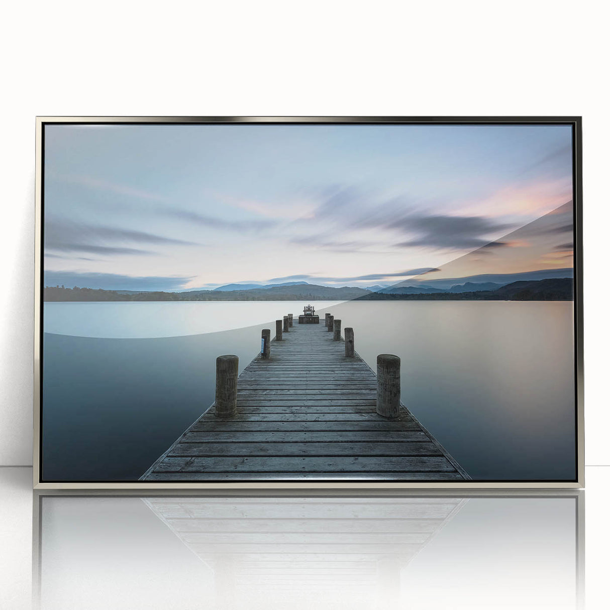 Framed acrylic wall art from the Landscapes & Seascapes collection, showcasing a serene ocean view with soft blue tones and silver accents, perfect for modern decor.