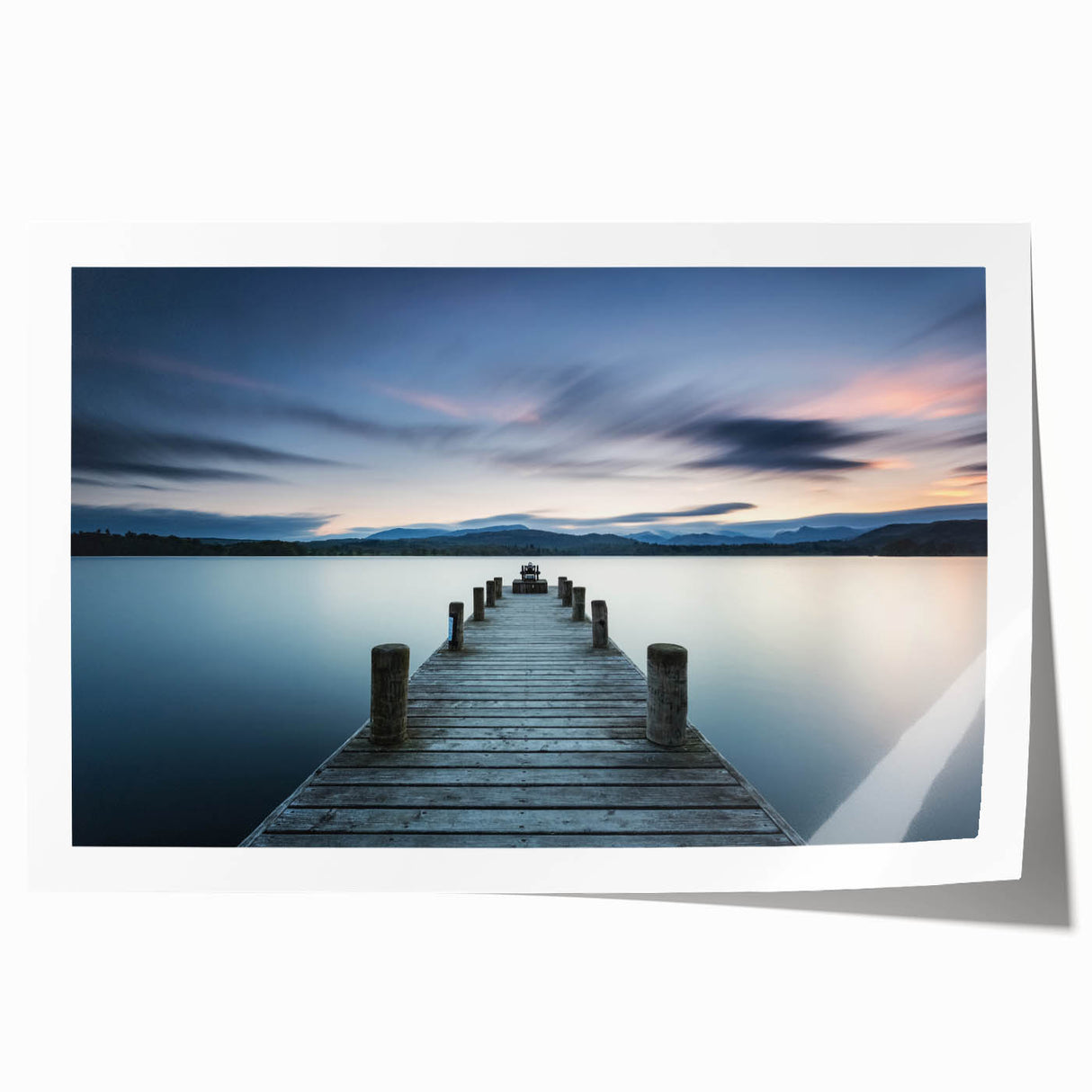 Serene coastal landscape wall art print featuring tranquil blue ocean waves and soft sandy beach, rolled for easy display and shipping, ideal for home decor.