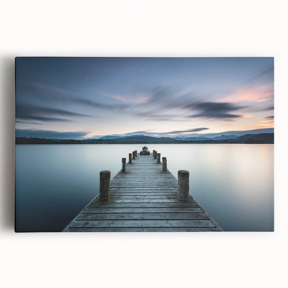 Stretched canvas wall art showcasing a serene seascape design with vibrant blues and gentle waves, ideal for coastal-themed home decor. Perfect for adding tranquility to any living space.