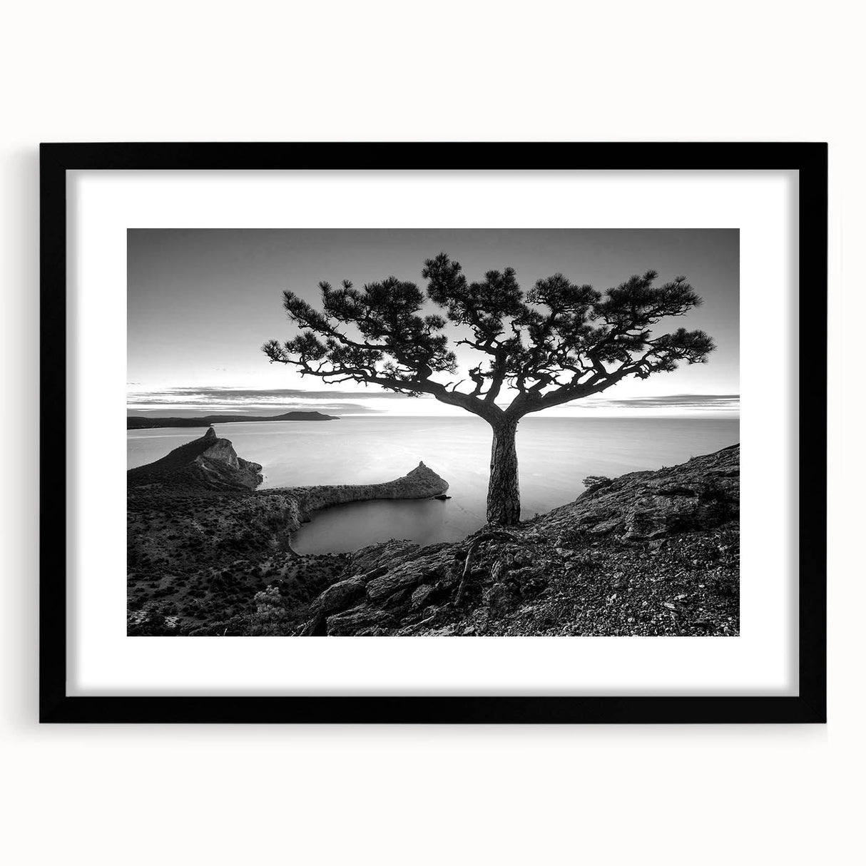 Framed wall art collection showcasing a serene seascape design with a black mat and frame, ideal for home decor and enhancing interior aesthetics.