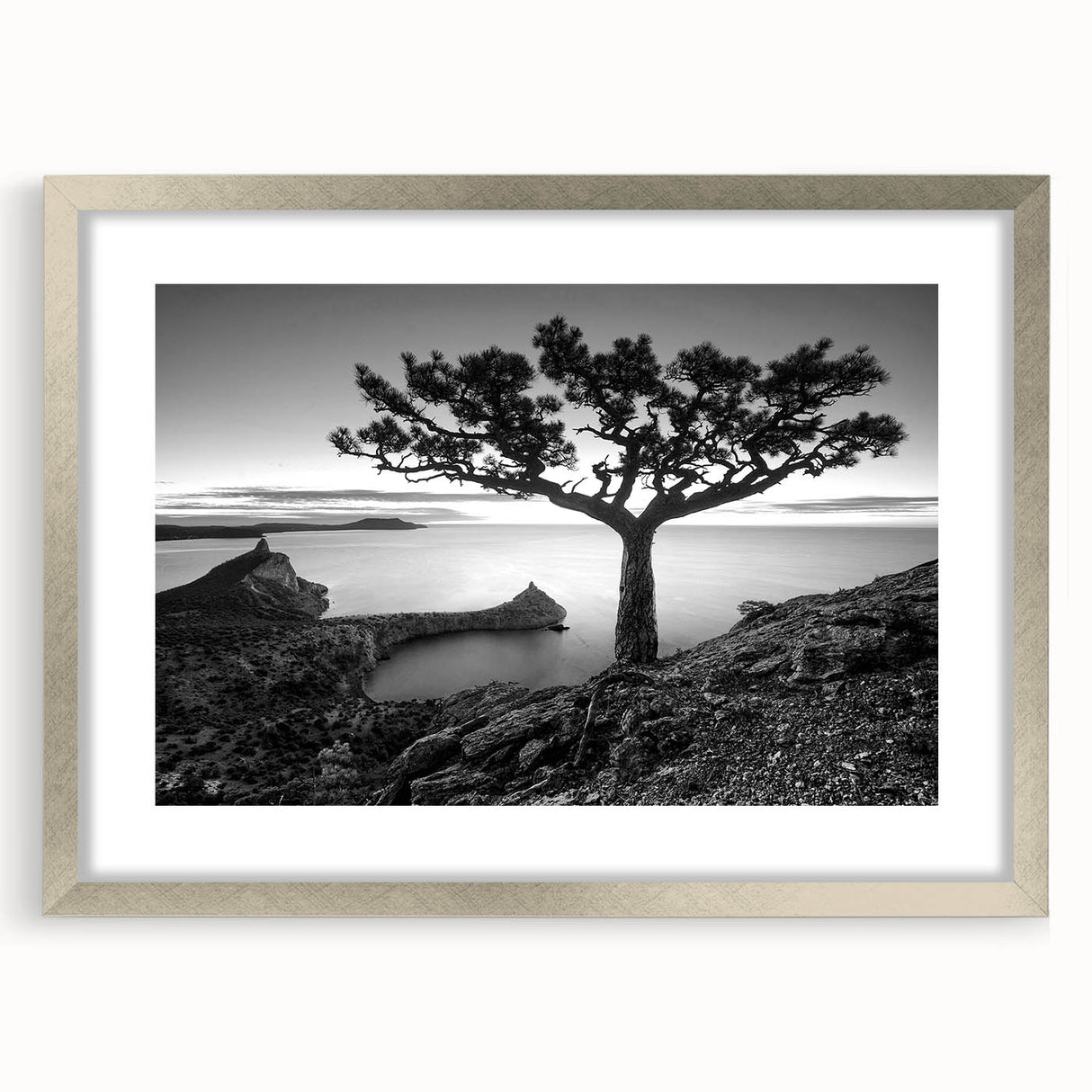 Elegant silver-framed wall art showcasing a serene seascape design, complete with a decorative mat, perfect for enhancing modern interior decor.
