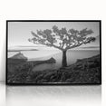 Framed acrylic wall art showcasing a vibrant seascape design with deep blues and greens, set against a sleek black frame, perfect for modern home decor.