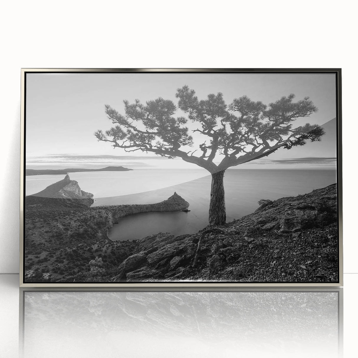 Framed wall art collection showcasing a serene seascape design with silver accents, ideal for modern home decor, enhancing any living space's aesthetic.