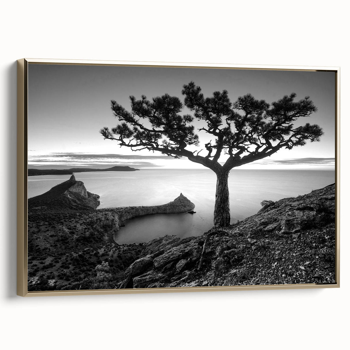 Framed canvas artwork showcasing a seascape design with gold accents, displayed at an angle to highlight its elegance and texture, ideal for modern home decor.