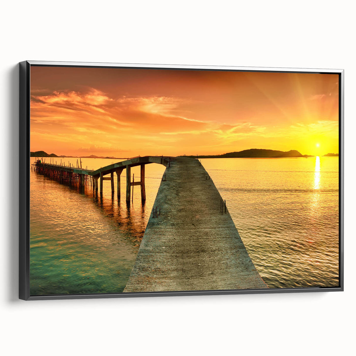 Framed canvas artwork showcasing a stunning seascape design with vibrant blue and green hues, highlighting waves and coastal elements, side view of the black frame.