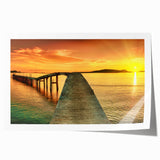 Rolled print of a serene seascape featuring calming blues and soft white waves, perfect for coastal-themed decor, packaged securely in a protective tube.