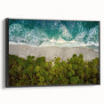 Framed wall art showcasing a seascape design, featuring vibrant blues and greens, with a sleek black frame, ideal for coastal-themed home decor.