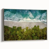 Framed canvas wall art showcasing a serene seascape design, featuring calming blues and silvers, perfect for coastal-themed home decor. The piece adds elegance and tranquility to any room setting.