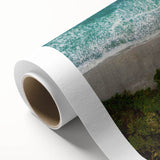 Rolled canvas artwork showcasing a serene seascape design with calming blue and green tones, ideal for home decor. Features a textured surface to enhance visual appeal.