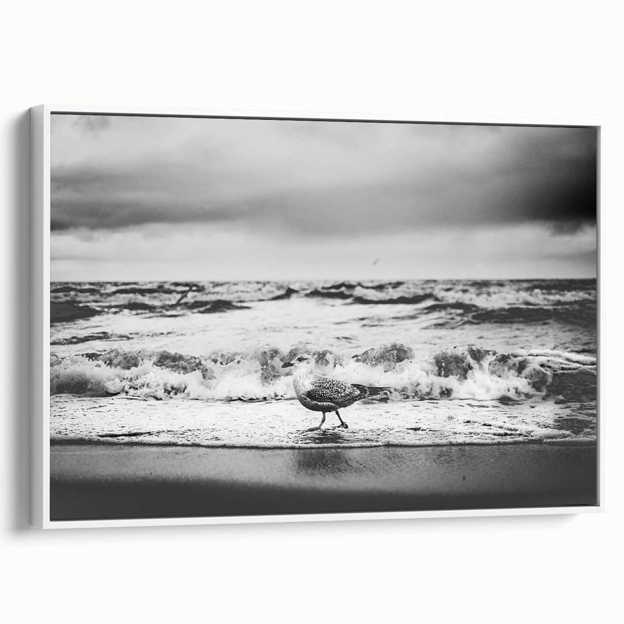 Framed canvas wall art showcasing a serene ocean landscape with vibrant blues and subtle whites, designed to enhance modern home decor with its elegant side view.