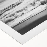 Rolled canvas artwork showcasing a vibrant seascape design with dynamic blue waves and a serene sunset, ideal for coastal-themed home decor or art collections.