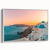 Framed canvas wall art showcasing a serene seascape landscape design with soft blue and white tones, displayed in a sleek white frame, ideal for coastal home decor.