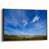 Framed canvas wall art from the Landscapes Skyscapes collection, showcasing a serene nature scene with vibrant colors and a sleek black frame, perfect for home decor.
