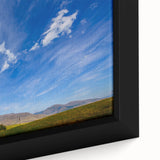 Framed close-up of a vibrant landscape canvas art piece, showcasing rich colors and intricate details, perfect for enhancing home decor with a modern touch.