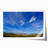 Vibrant rolled print showcasing a stunning landscapes and skyscapes design, featuring rich colors and intricate details, perfect for modern home decor.