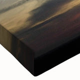 Close-up of a stretched canvas wall art piece showcasing a vibrant landscape design with colorful skies, ideal for modern home decor. Perfect for enhancing living spaces.