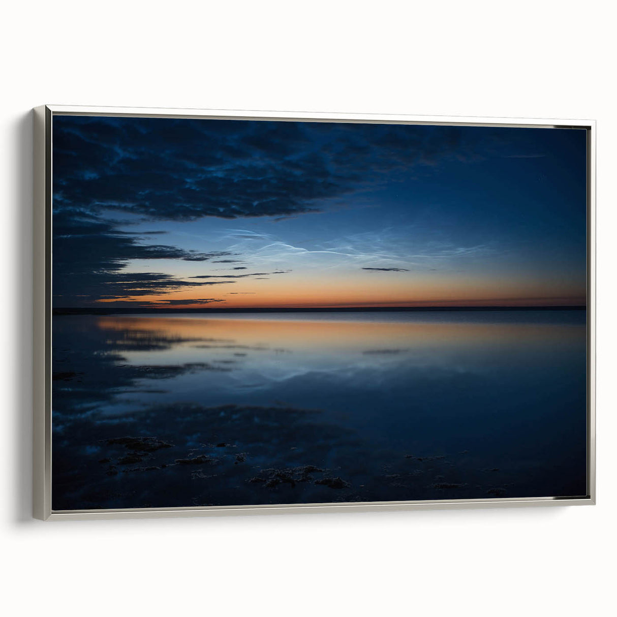 Framed canvas wall art depicting a serene landscape with vibrant colors and a silver frame, showcasing a modern artistic interpretation of nature's beauty.