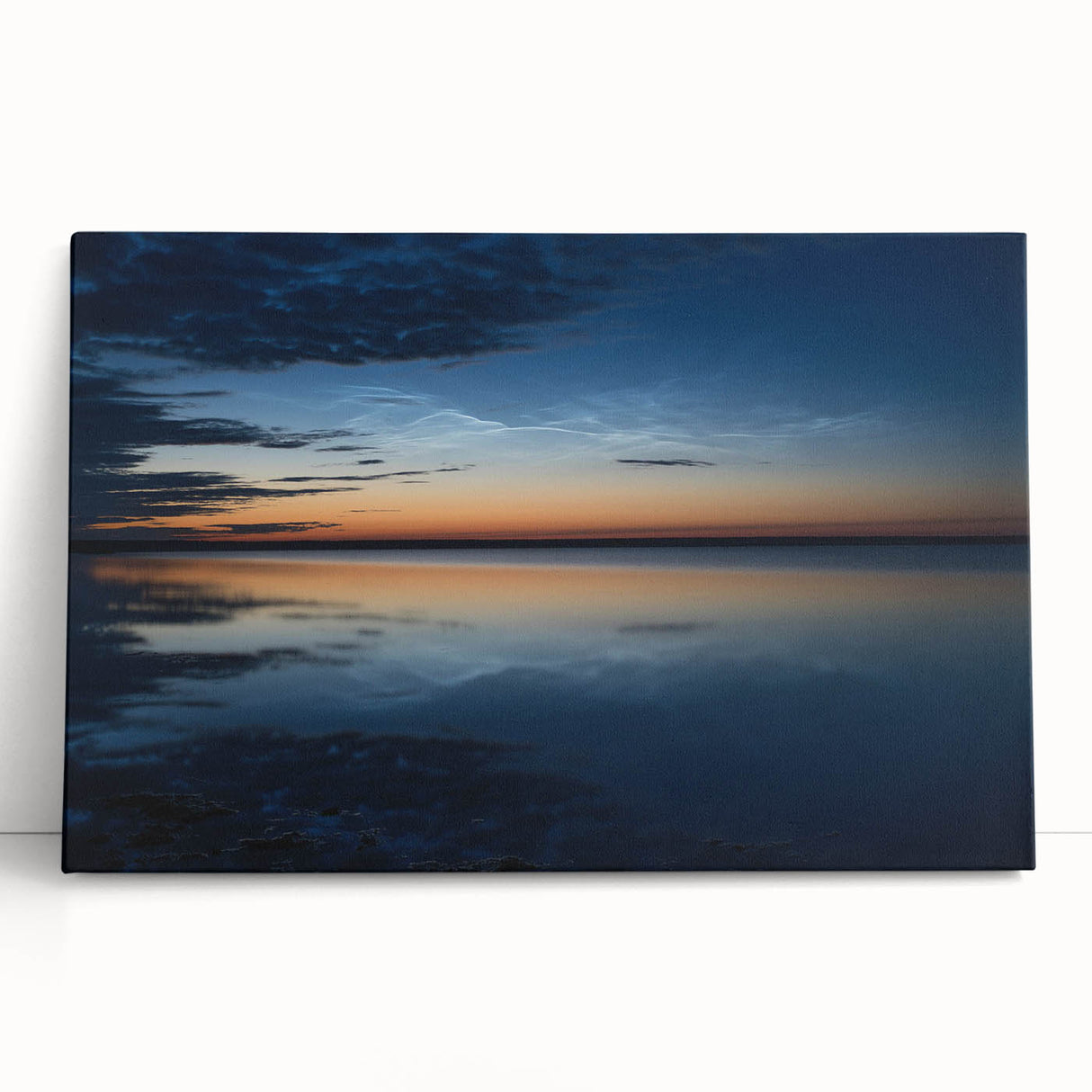 Stretched canvas wall art featuring a serene landscape with soft pastel colors and dramatic skies, ideal for home decor and enhancing interior aesthetics.