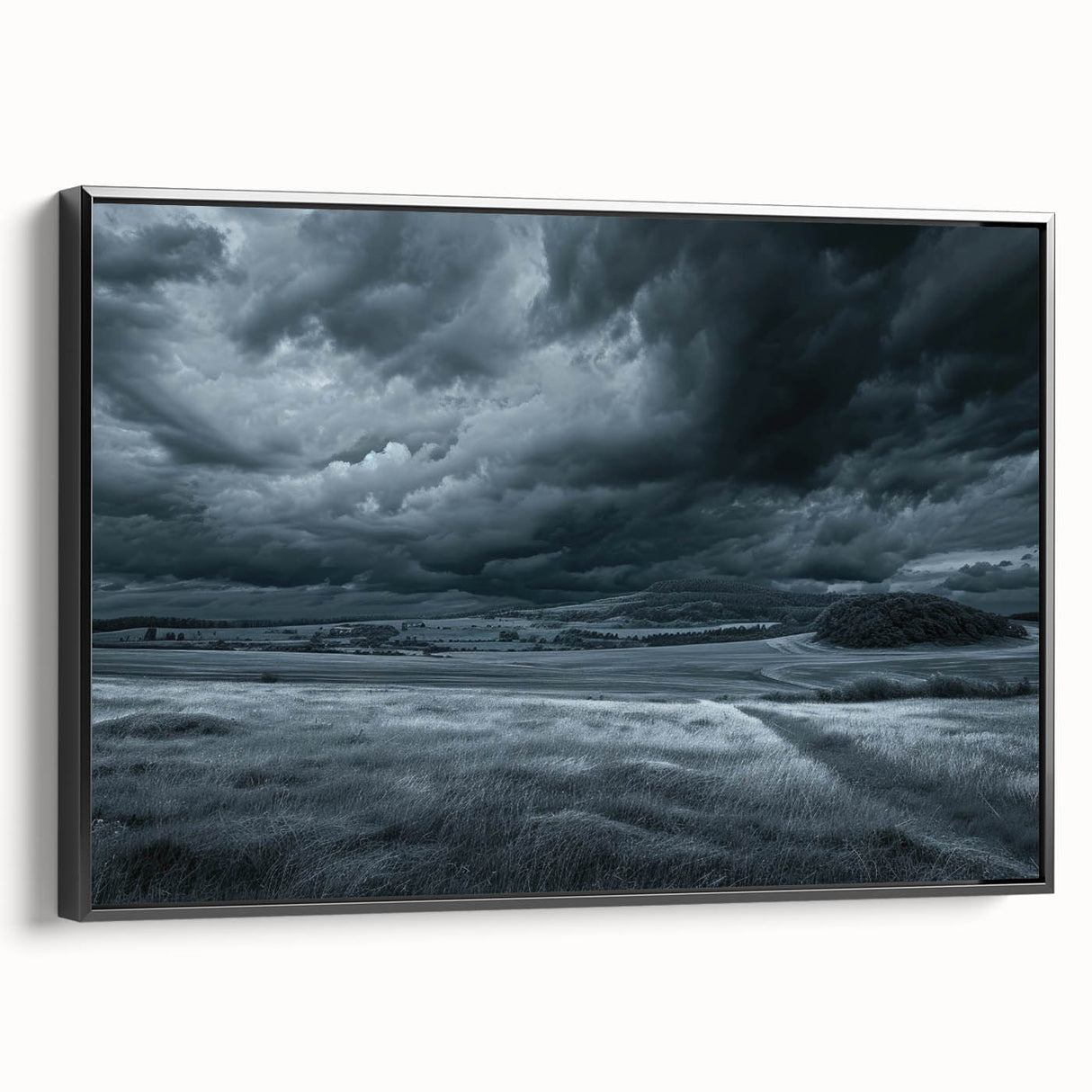 Framed wall art from the Landscapes & Skyscapes collection, showcasing a serene sunset over mountains with vibrant colors and a sleek black frame, adding elegance to any room.