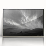 Framed wall art featuring a stunning landscape and skyscape design in a silver-acrylic frame, ideal for enhancing modern home decor. This piece adds elegance and sophistication to any room.