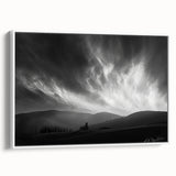 Framed canvas wall art featuring a serene landscape scene with a sunset sky, displayed from a side view against a white background, ideal for home decor.