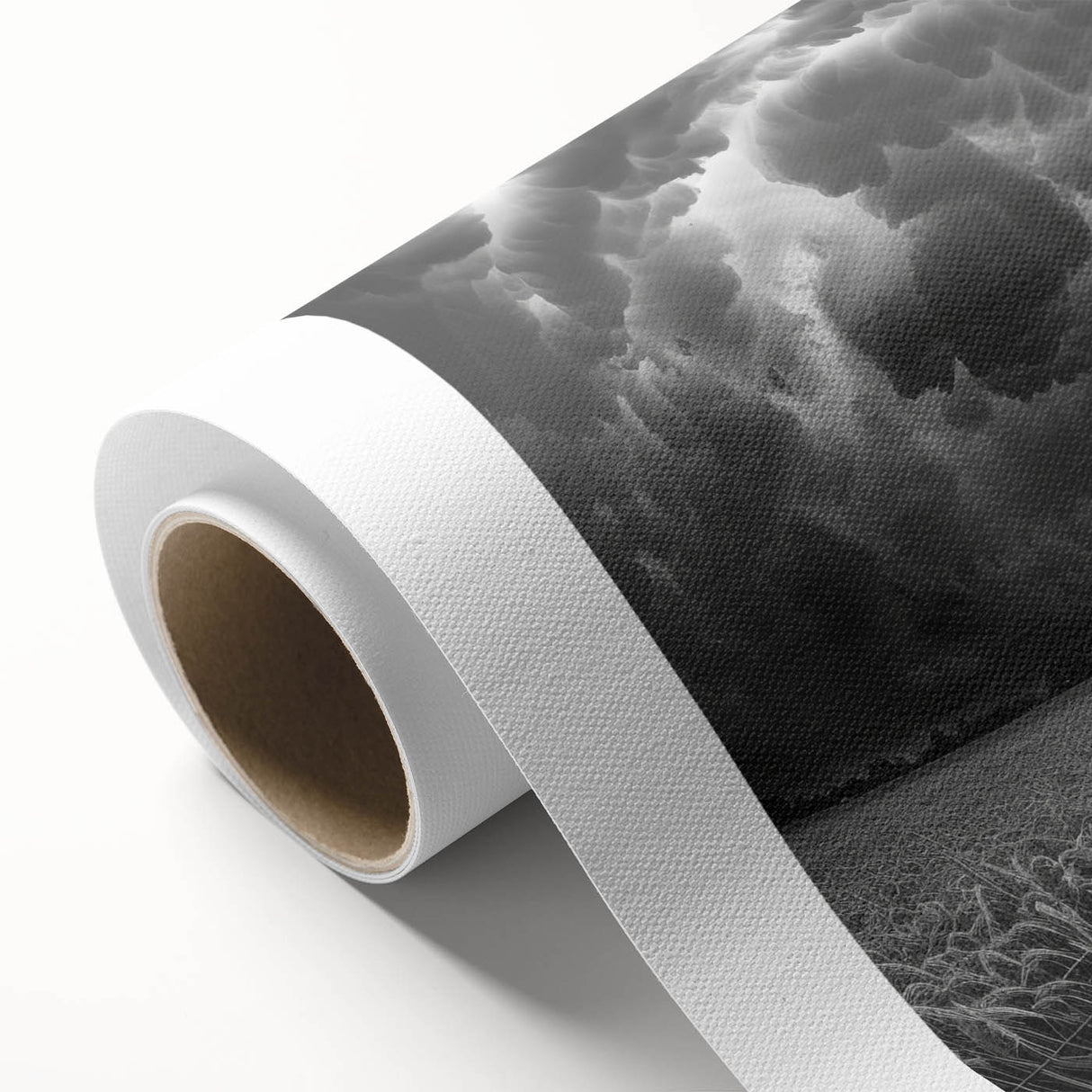 Rolled canvas showcasing a vibrant landscape and skyscape design, displaying a blend of warm hues and intricate details, perfect for enhancing home decor aesthetics.