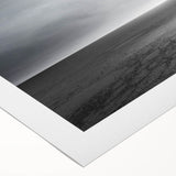 Colorful rolled canvas artwork depicting a vibrant abstract landscape with swirling skies and dynamic colors, ideal for modern home decor, presented in protective packaging.