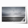 Vibrant rolled print showcasing a stunning landscape with dramatic skies, featuring rich colors and intricate details, perfect for home decor.